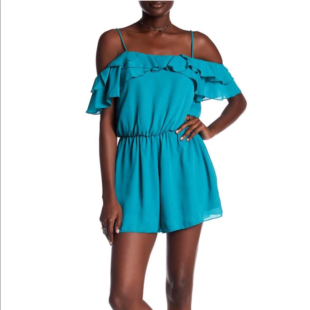 NSR ruffle of shoulder romper